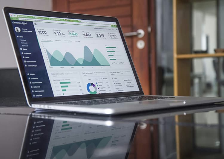 digital marketing strategy and graph on a laptop